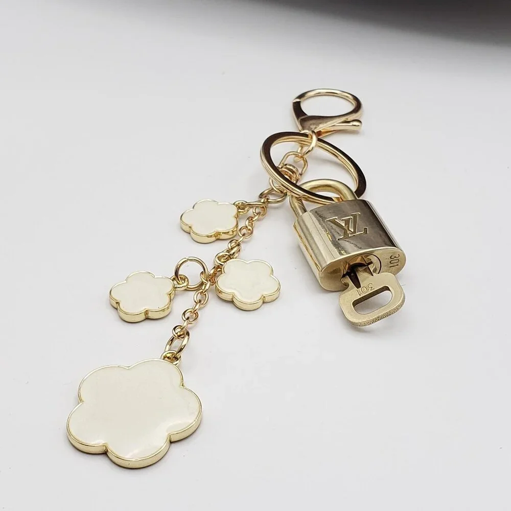 Authentic Louis Vuitton Lock & Key with Unbranded Flower Charm, Keychain